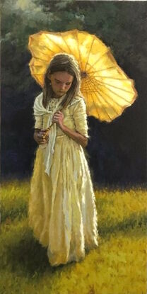 A young girl holding a parasol.