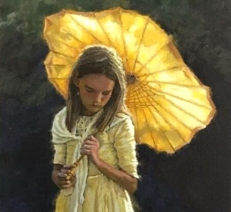 A young girl holding a parasol.