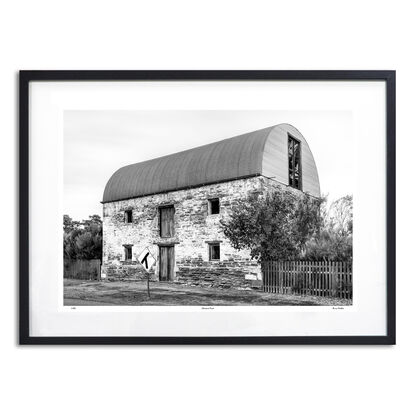 abandoned pioneers hut in rural farm setting