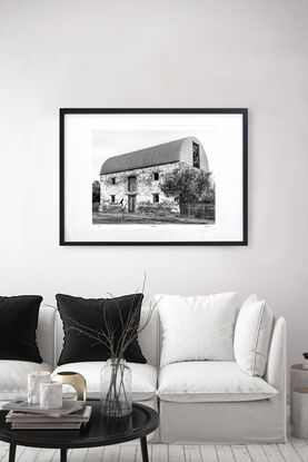 abandoned pioneers hut in rural farm setting