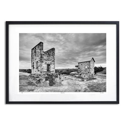 abandoned pioneers hut in rural farm setting