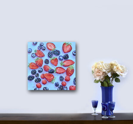 A square oil painting of blueberries, blackberries, raspberries and strawberries on a blue background. Some of the strawberries are sliced in half.