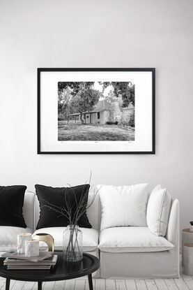 abandoned pioneers hut in rural farm setting