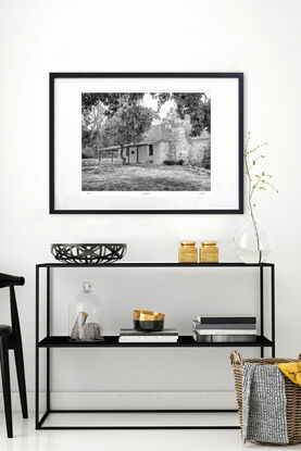 abandoned pioneers hut in rural farm setting