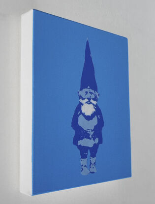 A Dark Blue Gnome with a  White Beard and Moustache standing against a Light Blue Background.