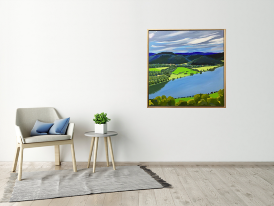 A view of the Hawkesbury River from Hawkins Lookout Point under a cloudy moody grey sky. There are trees in the foreground directly underneath the viewer and trees lining the river and dark blue and green hills and trees in the distance. 