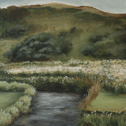 Painting of riverbank with little white wildflowers and hills in the background.