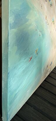 People on the beach. Colourful bathing boxes, beach umbrellas and three kayakers. Aerial view of an Australian beach.