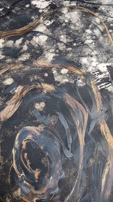 A large painting of a of a rockpool with metallic gold,copper,gunmetal and black and white.