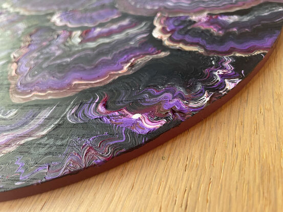 Purple coral patterns on circle board