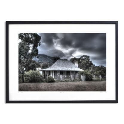 abandoned pioneers hut in rural farm setting