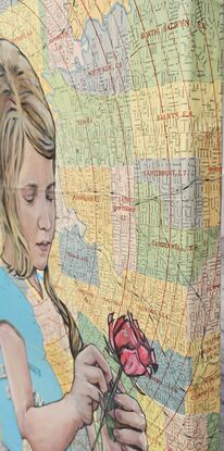 Young girl picking rose on vintage map of Melbourne Victoria. 