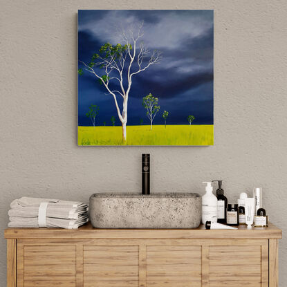 Australian landscape in blues and lime with a stormy sky and a gum tree in the foreground