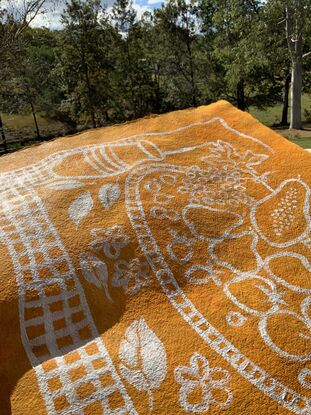 Still life fruits and vase on picnic mat