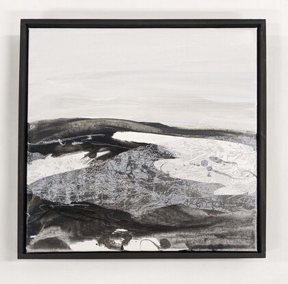 A black and white abstract landscape of mountains