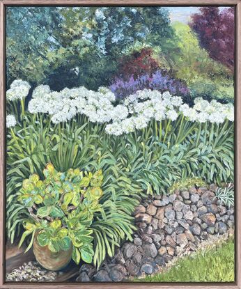 Painting of a garden filled with trees and bushes  in shades of green, red, deep purple and blue-green. White agapanthus fill the middle ground behind a rock wall. A terracotta pot sits on a step and is filled with a bright green sedum plant.