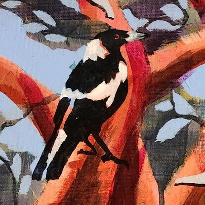 Stencilled magpie superimposed against angophora tree