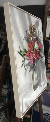 Bunch of flowers in glass vase with Red Gum Flowers, Grevilleas, banksia and kangaroo paws