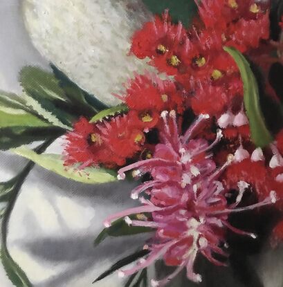 Bunch of flowers in glass vase with Red Gum Flowers, Grevilleas, banksia and kangaroo paws