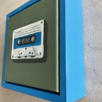 Cassette tape on green background 