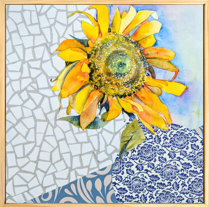 A single sunflower, facing towards the viewer, is created using watercolour. It sits in a blue and white detailed vase, on a blue and white tablecloth - both created using collaged paper. The background is a white, geometric, marble-like texture, also created in collaged paper. 