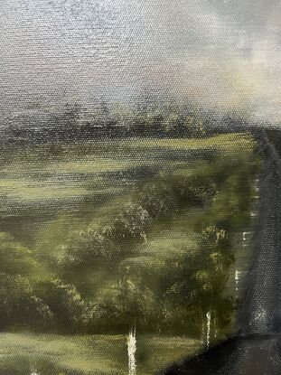 Warm dusk storm clouds over pasture and country road.  