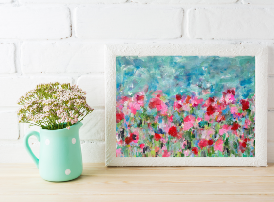 Landscape painting with abstract textured flowers on watercolour paper adorned with pinks, magenta, red, on a background of green foliage with a dreamy blue sky