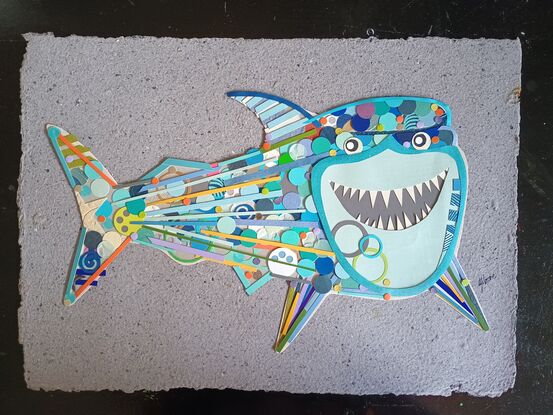 Cartoon like collage of a great white shark grinning