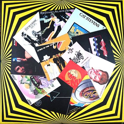 A circular array of record covers on a groovy black and yellow floor mat from the 1970s