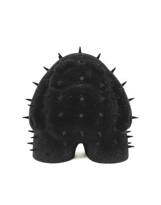 A black spiky figure covered in a black and glitter velvet flock. 