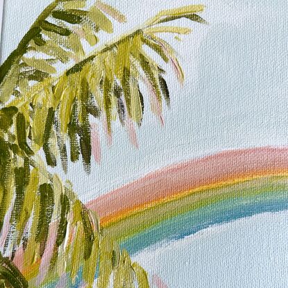 The beach sky with Rainbow and palms