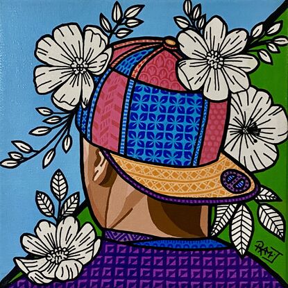 Acrylic painting  of a  colourful flat brim cap design with black and white flowers and using paint markers creating intricate patterns and bold black outlines on a blue and green background