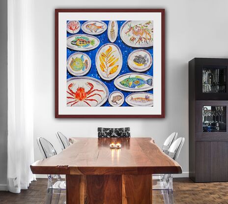 A colorful original watercolor of a collection of handmade ceramic plates with sea life painted on them including a leafy sea dragon, a crab, an octopus, a sea slug and an assortment  of reef fish all on a bright blue background.