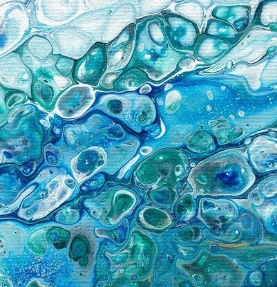 Fresh ocean wave flowing with bubbles