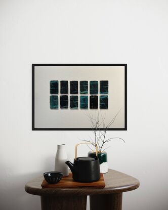 14 mini etching panels. Imagery is of the interior of the heart, the imagery looks like a root system or tree branches. Blue, black colours. 2 rows of 7 panels printed on handmade Japanese paper with soft deckled irregular edges. Mounted and unframed.