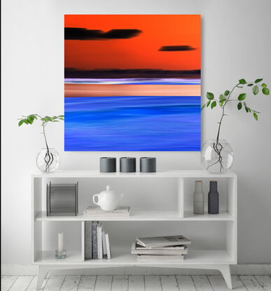 dark blue ocean and orange sunset