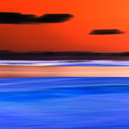 dark blue ocean and orange sunset