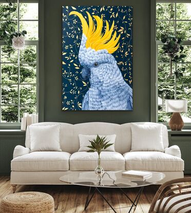 Sulphur crested cockatoo on a deep blue background with metallic gold floral design.