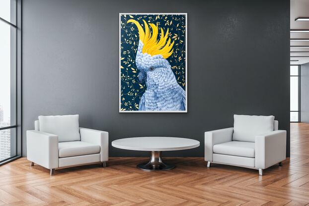 Sulphur crested cockatoo on a deep blue background with metallic gold floral design.