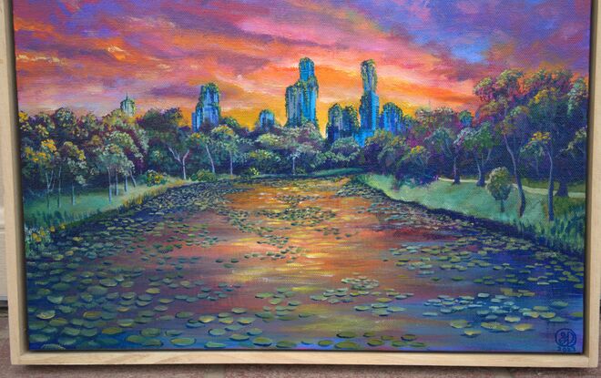 Overgrown futuristic fictional depiction of Melbourne's Yarra River with a sunset sky.