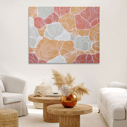 An abstract artwork wth large curved cell-like shapes in warm peach hues and with concentric white lines delineating the forms.