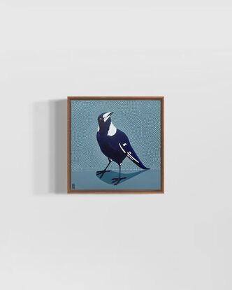 Black and blue toned magpie on pale blue background with white dot patterned background. 