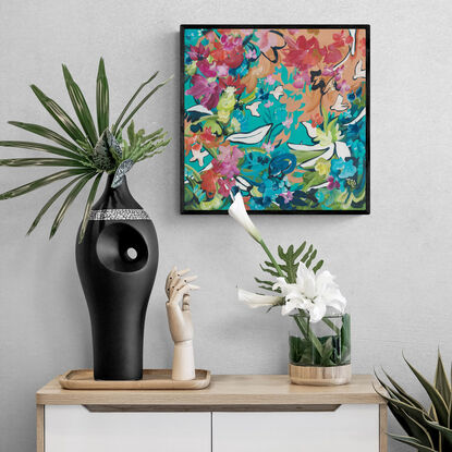 small colourful abstract canvas print of a tropical inspires flower garden landscape with colourful flowers and white birds.