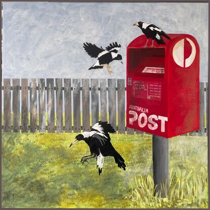 Magpies flying around mailbox