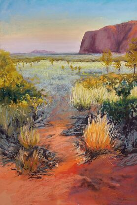 sunrise colours of Uluru to rich earth and grasses. 