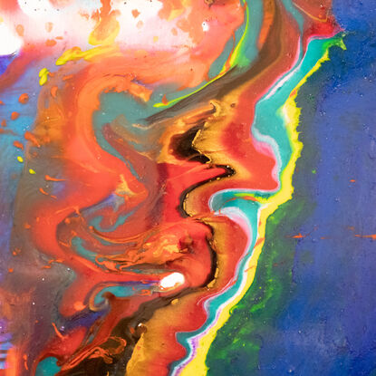 This is a mixture of multiple liquid mediums that have been mixed together to create a dancing array of colour. 