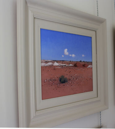 The red earth and blue sky of White Cliffs