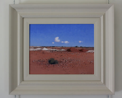 The red earth and blue sky of White Cliffs