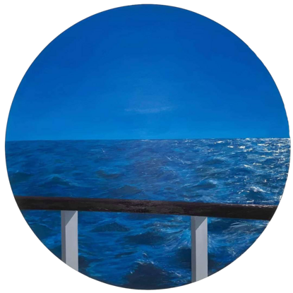 Blue sky and open ocean from boat view.