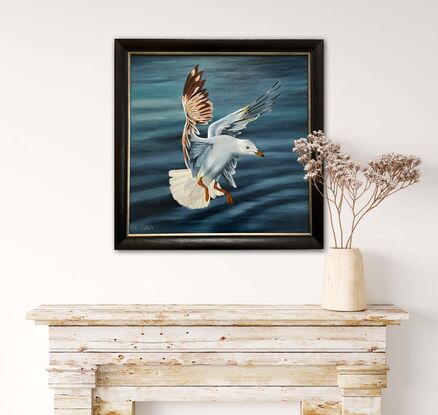 Oil painting of a seagull in flight, about to land.  There's water in the background.